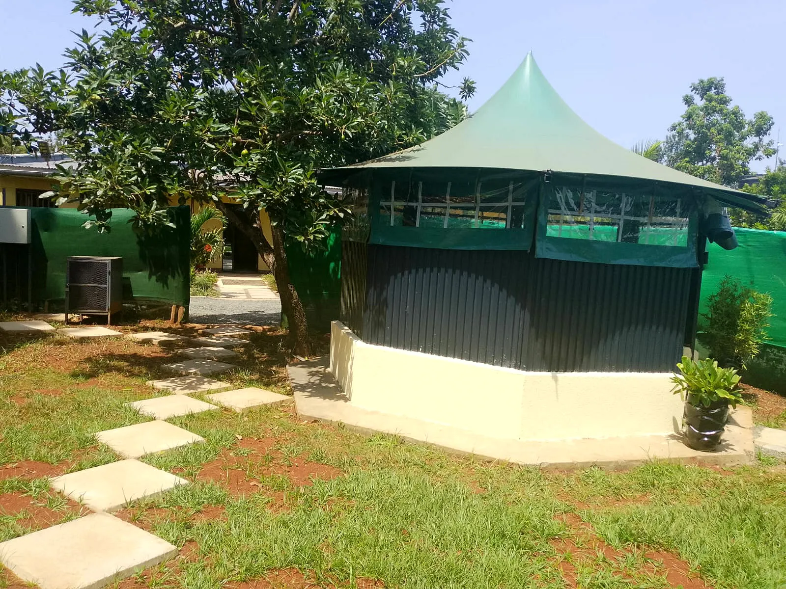 Garden gazebo under the trees at LeGladje Resort